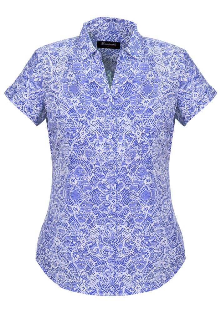 Patriot Blue short sleeve shirt for women, featuring a semi-fitted design, soft polyester fabric, and stylish pleat details.
