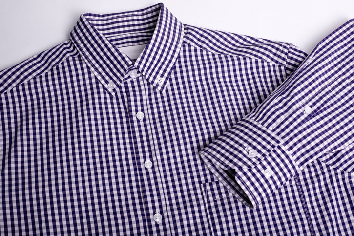 Men's purple long sleeve shirt in executive fit, crafted from 100% cotton with a check pattern, button-down collar, and front pocket.