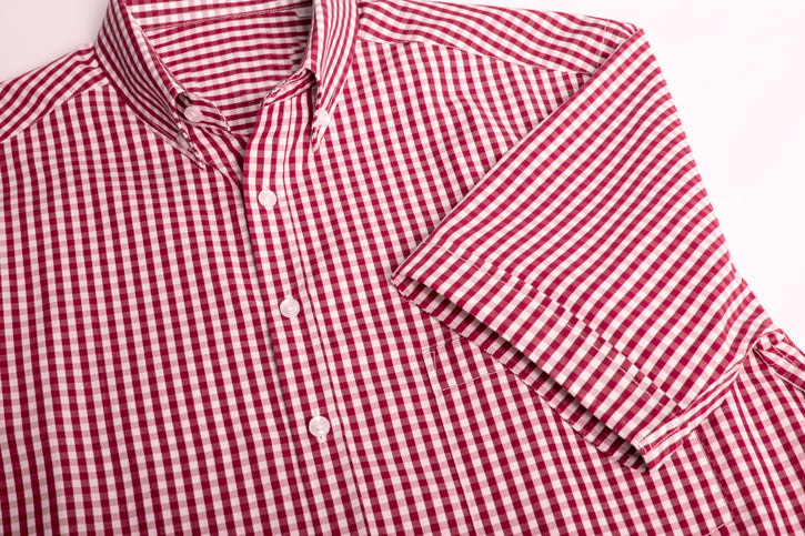 Springfield Men's Cardinal Short Sleeve Shirt in executive-fit, featuring a bold check pattern and front pocket for style and comfort.