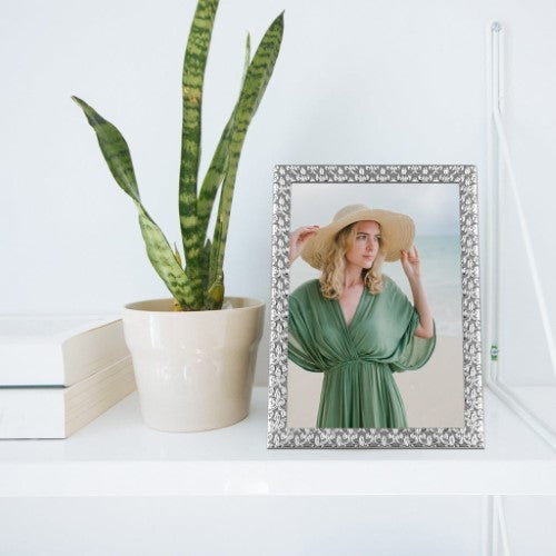 Elegant 8x10in Renaissance silver metal photo frame with embossed pattern, suitable for portrait or landscape display.