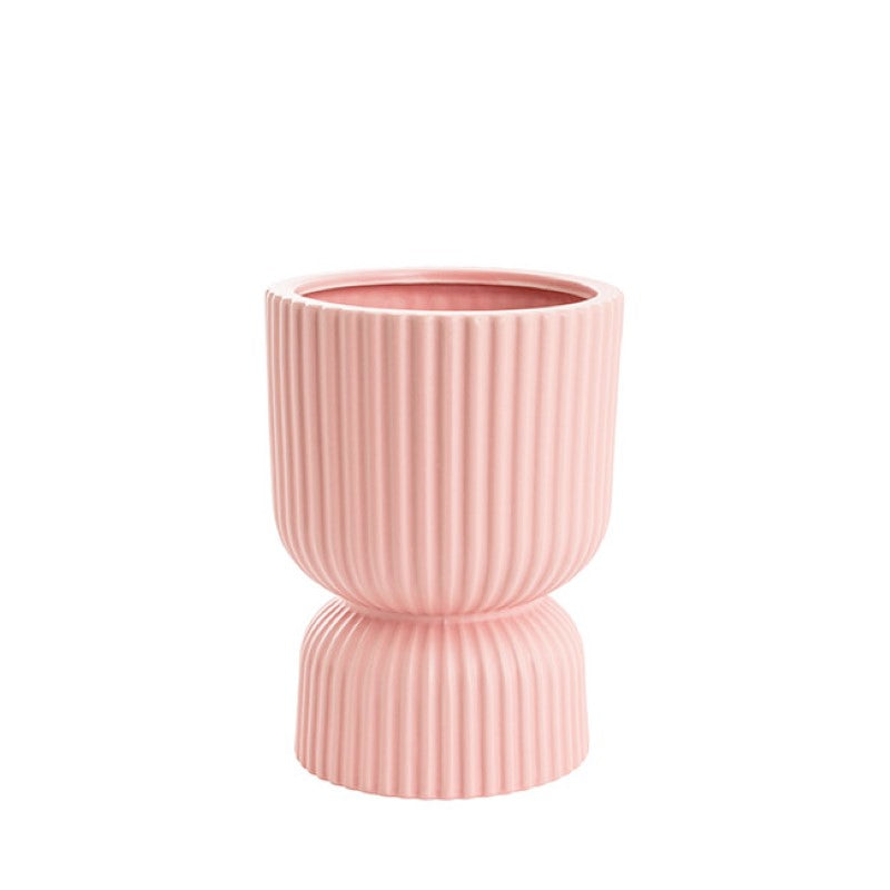 Matte light pink ceramic vase with egg cup design, perfect for flowers or succulents, 15cm diameter, 20cm height.