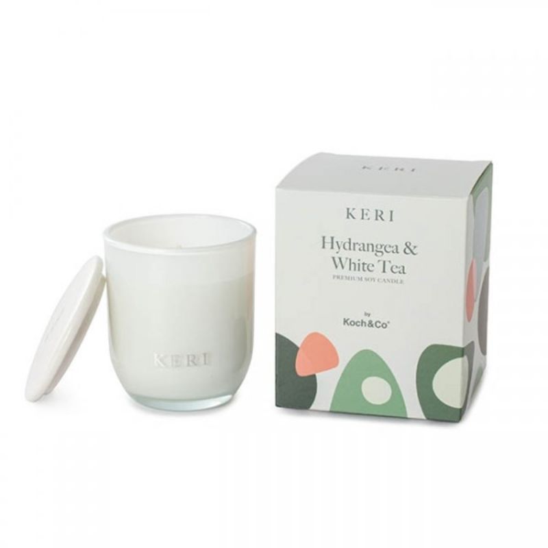 Luxury soy candle featuring hydrangea and white tea scents, burns cleanly for 30 hours, perfect for relaxation and home decor.