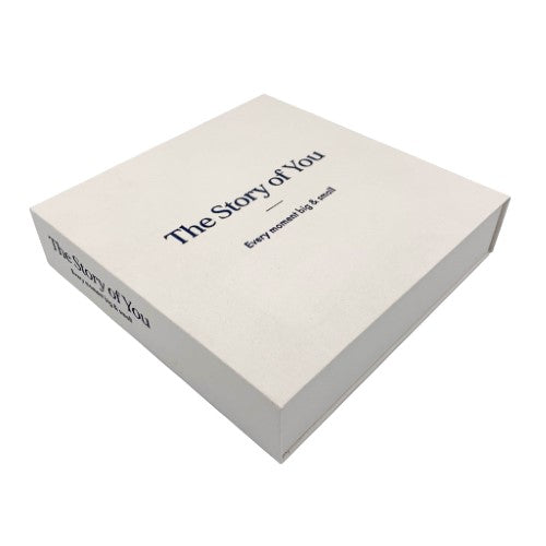 Elegant small drymount photo album with a natural cloth cover, embossed "The Story of You," perfect for preserving memories.