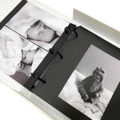 Elegant small drymount photo album with natural cloth cover, embossed title, and 60 expandable black pages for cherished memories.