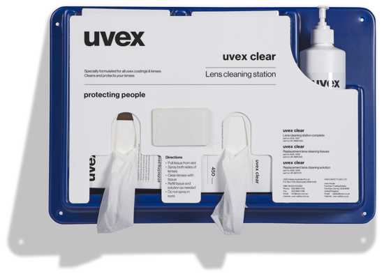 uvex Complete Lens Cleaning Station mounted on a wall, designed for safe, effective eyewear cleaning without smearing or scratching.
