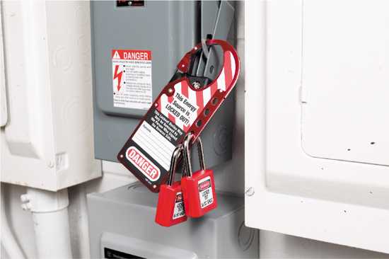 Aluminium lockout hasp with spring-loaded arm, holds 5 padlocks, includes safety labels for workplace maintenance safety.