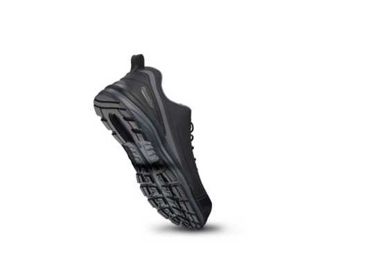 Women's black safety joggers with composite toe, breathable nylon upper, and slip-resistant outsole for work comfort.