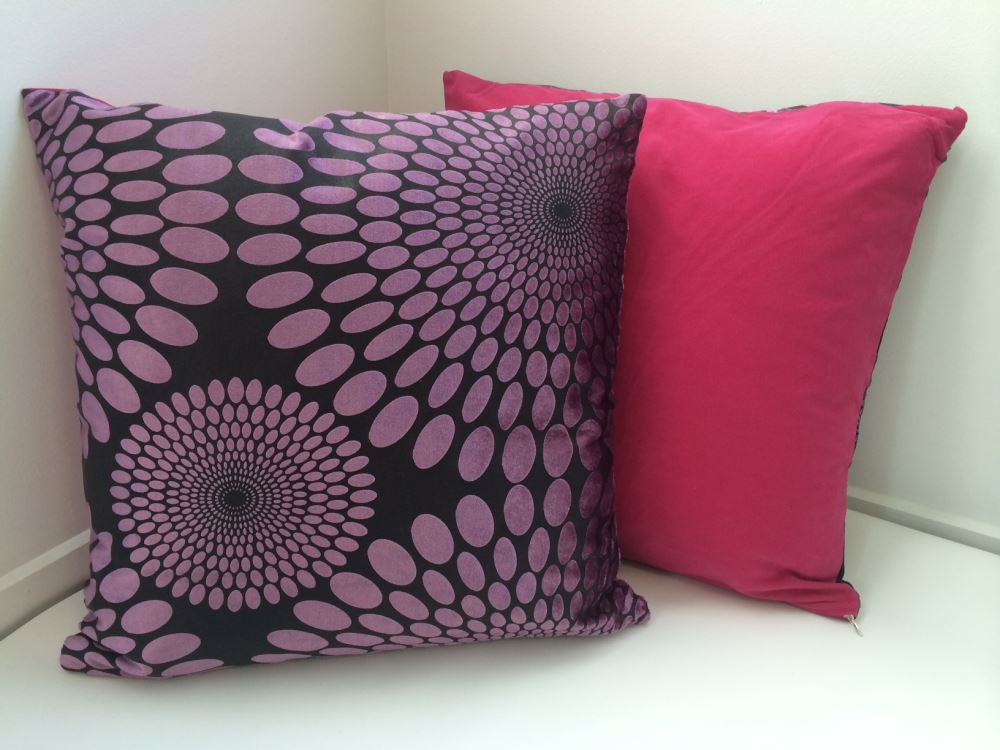 Pink Daisy Splash cushion covers set of 2, featuring a floral pattern and solid reverse, ideal for vibrant home decor.
