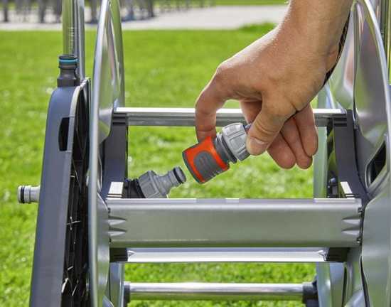 Gardena CleverRoll M Metal Hose Trolley: durable, space-saving design with ergonomic crank for easy hose management and stability.