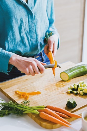 Eco-friendly Berghoff Balance Straight Peeler with sharp stainless steel blade and ergonomic handle for easy vegetable peeling.