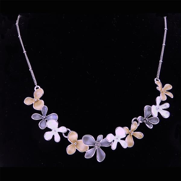 Rhodium plated silver necklace featuring delicate small flower designs, 46cm length with versatile styling options.