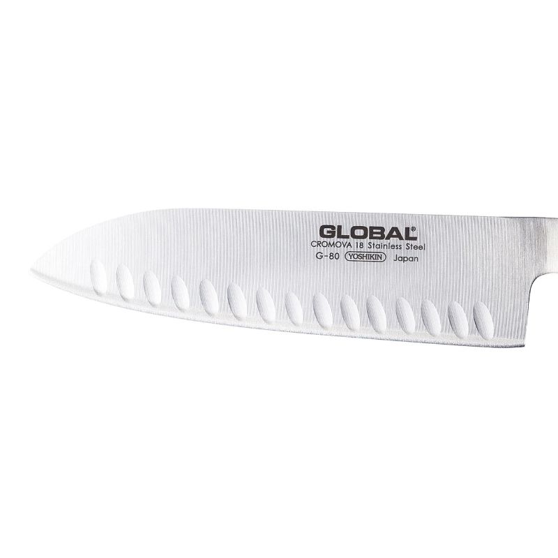 Global G-80 Granton Edge Santoku Knife (18cm) with sharp CROMOVA steel blade, fluted design, and ergonomic handle for precision slicing.