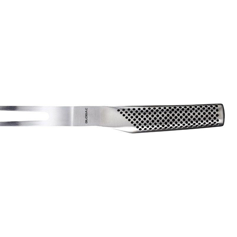 Global Classic Bent Carving Fork with sharp prongs, CROMOVA 18 steel, comfortable handle, and seamless hygiene-friendly design.
