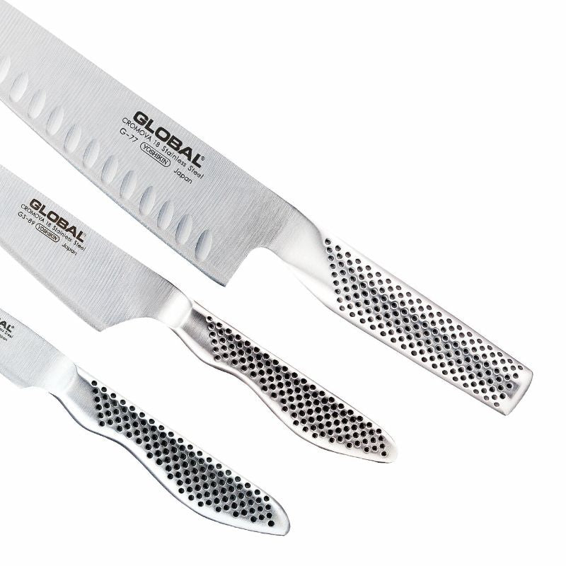 Global Classic 3 Piece Knife Set featuring a Fluted Cook's Knife, crafted for exceptional sharpness and balance in food preparation.