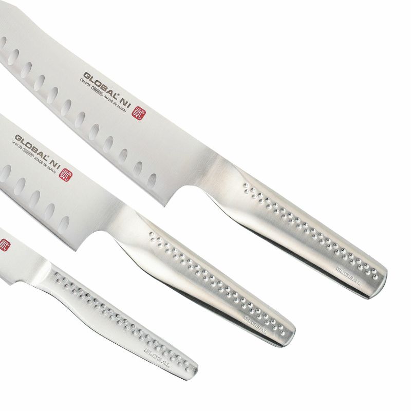 Global Ni 3-piece knife set featuring cook's, vegetable, and paring knives, crafted for precision and durability.