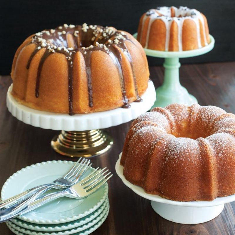 Nordic Ware Tiered Bundt 3 Piece Set in mint, featuring 12-cup, 6-cup, and 3-cup pans for elegant multi-tiered cakes.