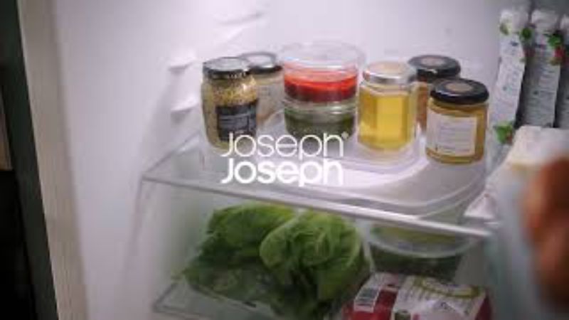 Joseph Joseph FridgeStore Rotating Organiser with 360-degree rotation, tiered design, and non-slip base for efficient fridge storage.
