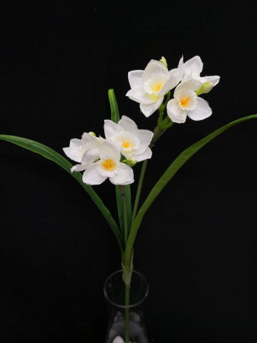 Lifelike white artificial daffodil stem with realistic leaves, perfect for floral arrangements and home decor.