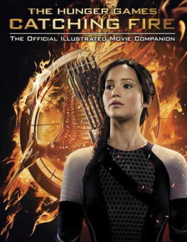 Official illustrated companion for "Catching Fire," featuring behind-the-scenes insights and stunning movie visuals.