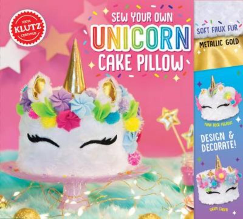 A colorful sewing kit for children to create a plush unicorn cake pillow with soft faux fur and vibrant pre-cut felt pieces.
