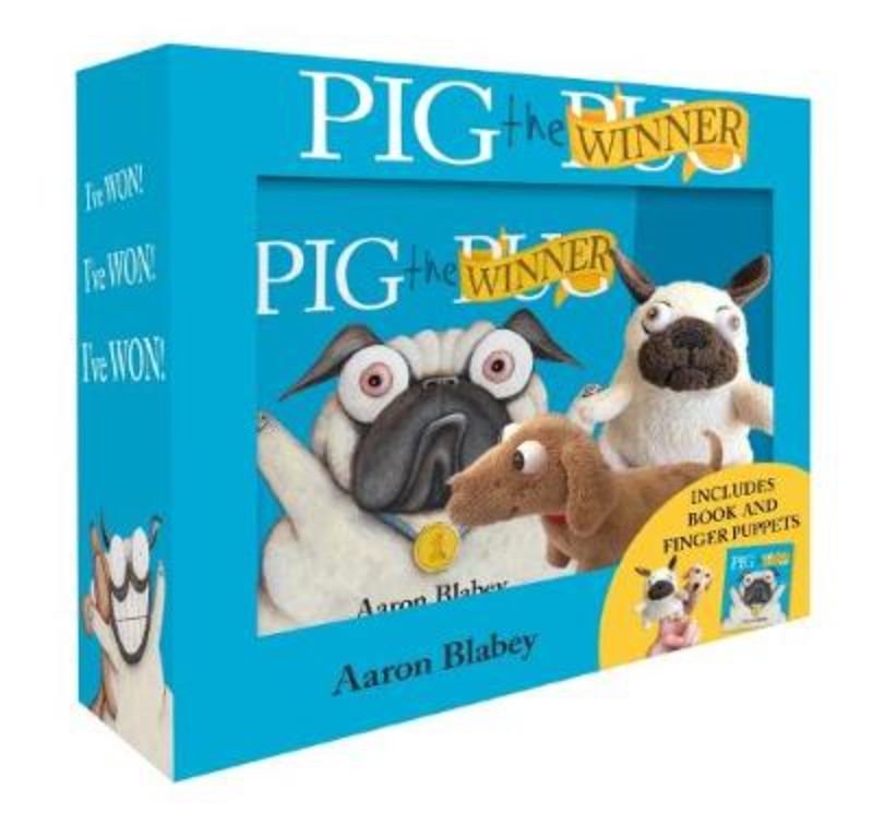 Illustrated children's book "Pig the Winner" with finger puppets of Pig and Trevor, teaching lessons on fairness and friendship.