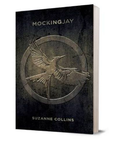 Cover of 'Hunger Games: #3 Mockingjay Capitol Edition' featuring Katniss Everdeen, symbol of rebellion in a dystopian world.