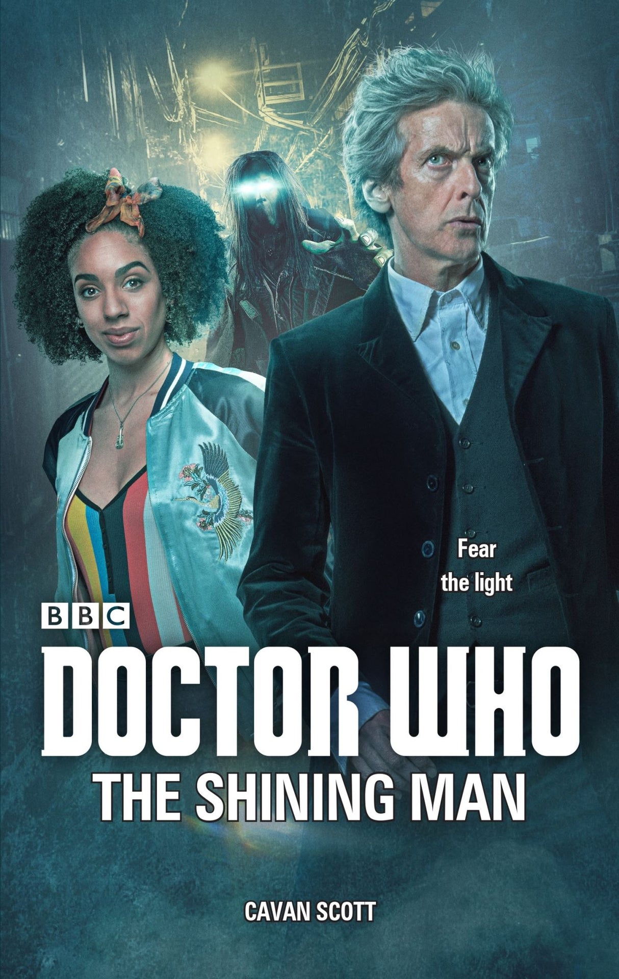 "Cover of 'Doctor Who: The Shining Man,' featuring the Twelfth Doctor and ominous Shining Men in a gripping sci-fi novel."
