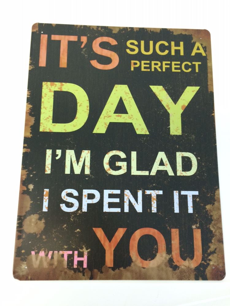 Vintage metal wall art plaque titled "Perfect Day," featuring a nostalgic design and easy hanging with four eyelet holes.