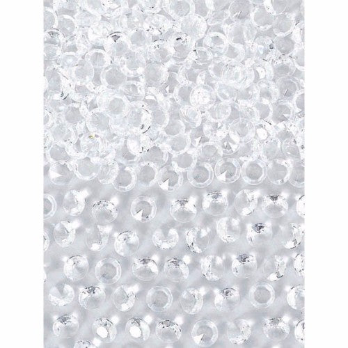 Clear plastic confetti gems with a pointed base, adding sparkling elegance to any celebration or decor.