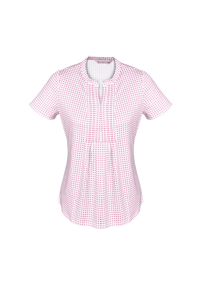 Vibrant melon knit top with pleat design, semi-fitted style for comfort and versatility in various sizes.