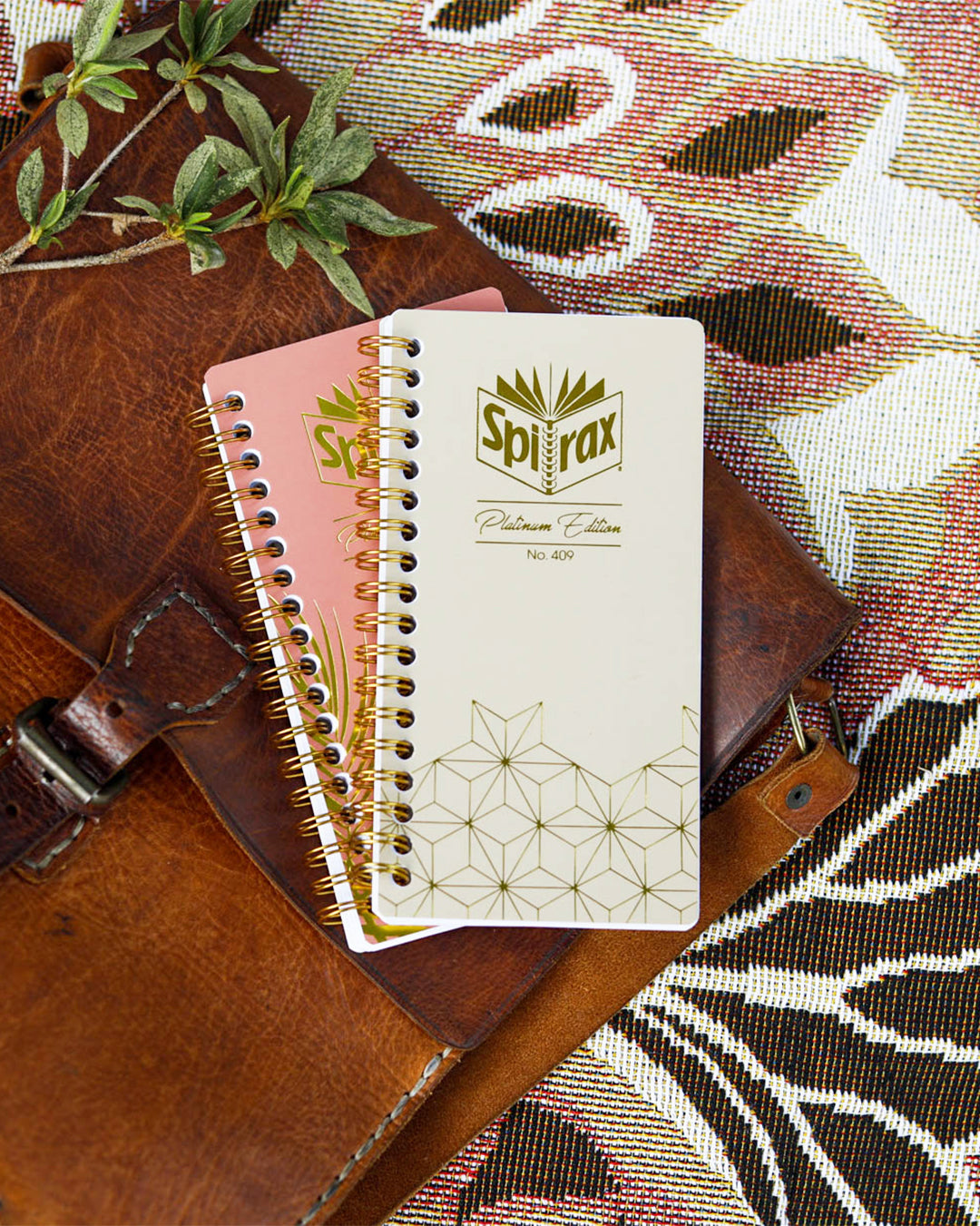 Vibrant Spirax Platinum Slimline notebook with hardback cover, premium paper, and spiral binding for easy note-taking.
