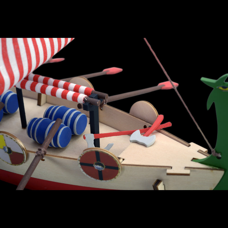 "Wooden Viking ship model kit for kids, featuring high-quality plywood, paints, sails, and easy assembly instructions."