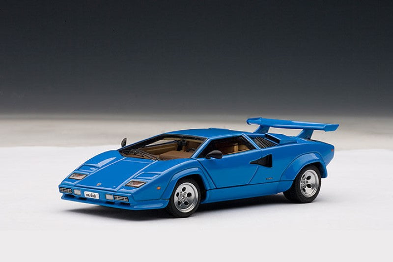 Diecast 1/43 Lamborghini Countach 5000S in blue featuring opening doors and detailed engine. Perfect for collectors and enthusiasts.