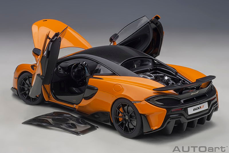 Diecast model of a 1/18 McLaren 600LT in Myan Orange, featuring detailed interior, engine, and functional moving parts.