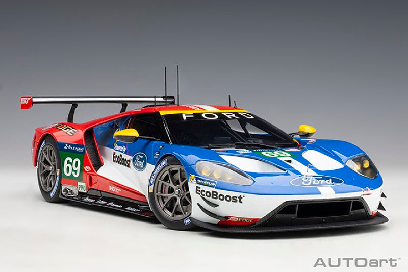 Diecast model of the 2016 Ford GT #69 driven by Scott Dixon, showcasing intricate details and sleek design.