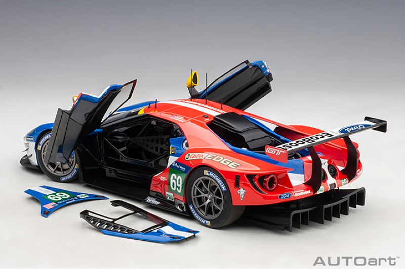 Diecast model of the 1/18 '16 Ford GT #69 driven by Scott Dixon, showcasing intricate details and sleek finish.