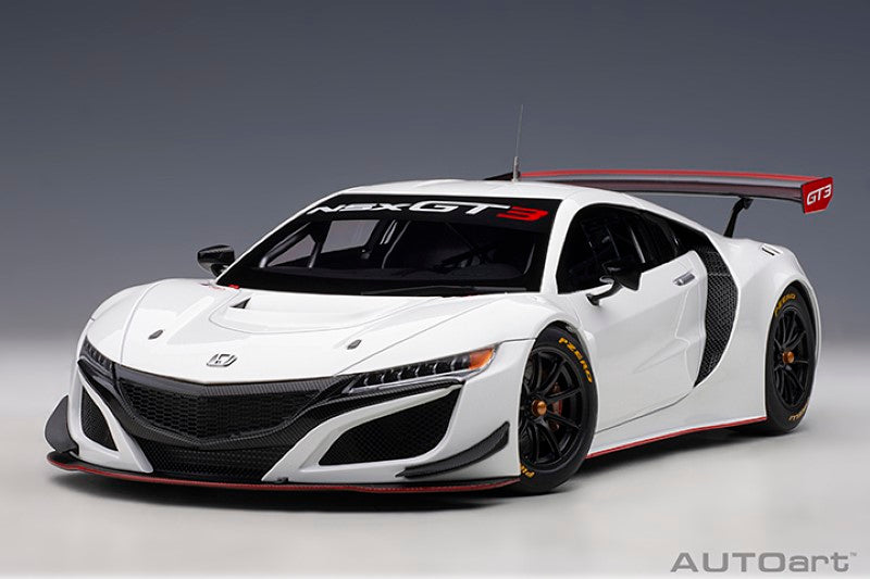 Diecast model of the 2018 Honda NSX GT3 in white, showcasing detailed aerodynamic design and intricate craftsmanship.