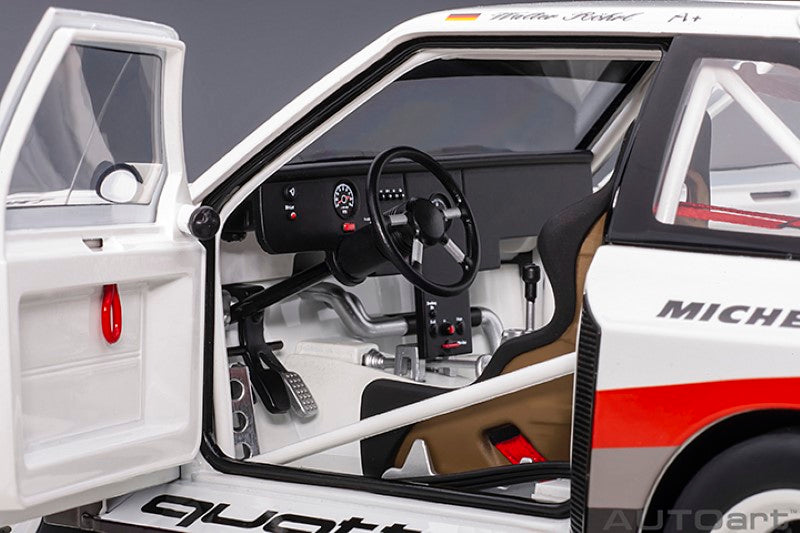 Diecast model of the '87 Audi Quattro S1 PP #1, showcasing vibrant colors and authentic details from Pikes Peak racing history.
