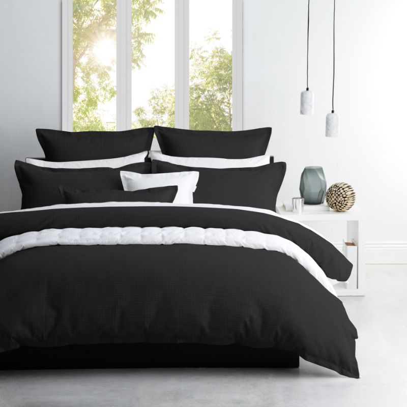 King Duvet Cover Set in Ascot Granite featuring a textured waffle weave and tailored edges, includes 1 cover and 2 pillowcases.