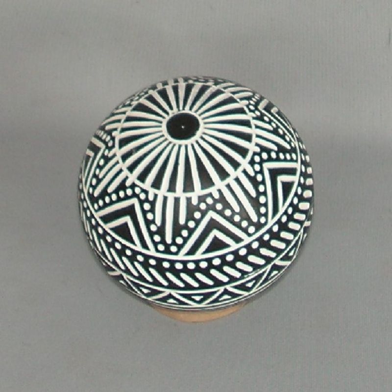 Matte black decorative ball ornament with Aztec design, perfect for stylish home decor and unique gifts.