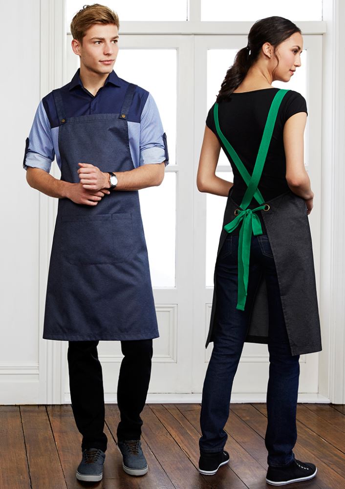 Unisex blue denim bib apron with x-back straps, front pocket, and durable fabric, designed for culinary and artistic use.