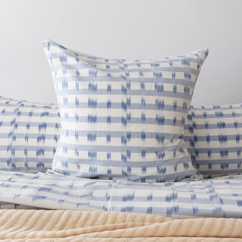 Luxurious Amara European Pillowcase in celestial blue and ivory, woven ikat design, 100% cotton, 65x65cm, from Bambury.