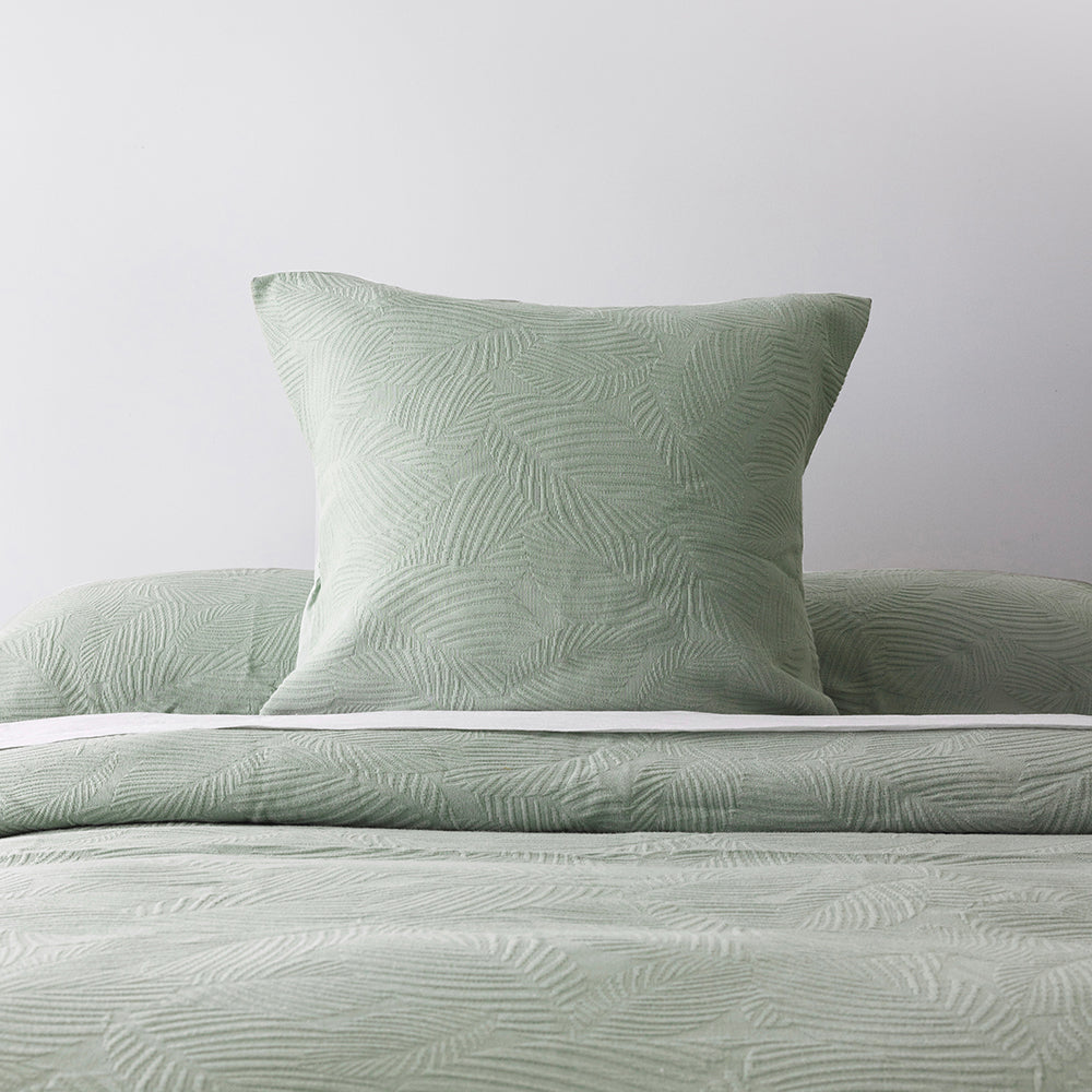 Elegant Wilmot European Pillowcase in soft green cotton with a subtle leaf pattern, ideal for enhancing bedding decor.