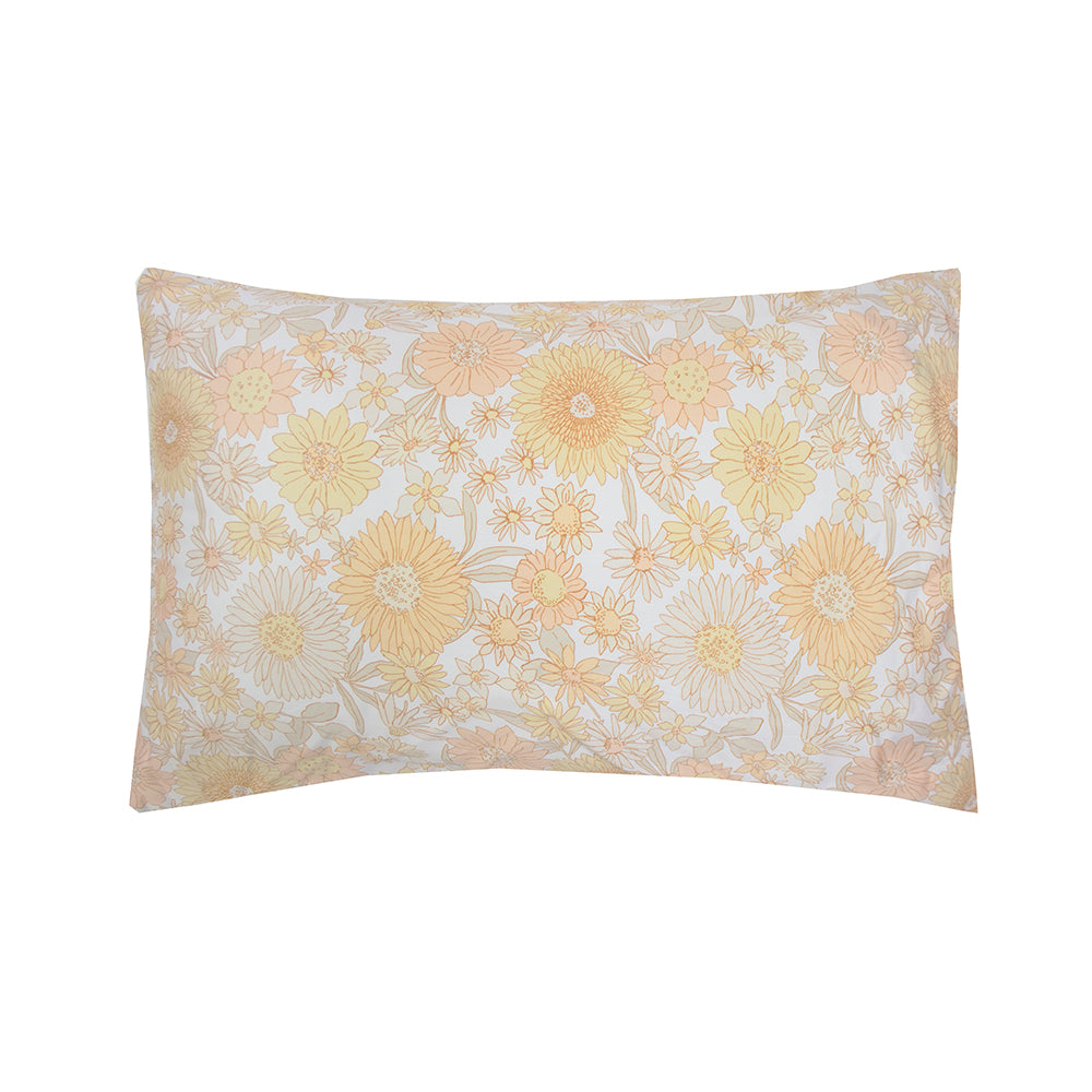 Daphne Duvet Cover Set features vibrant retro floral prints in yellows and peaches, made from 100% cotton, reversible design included.