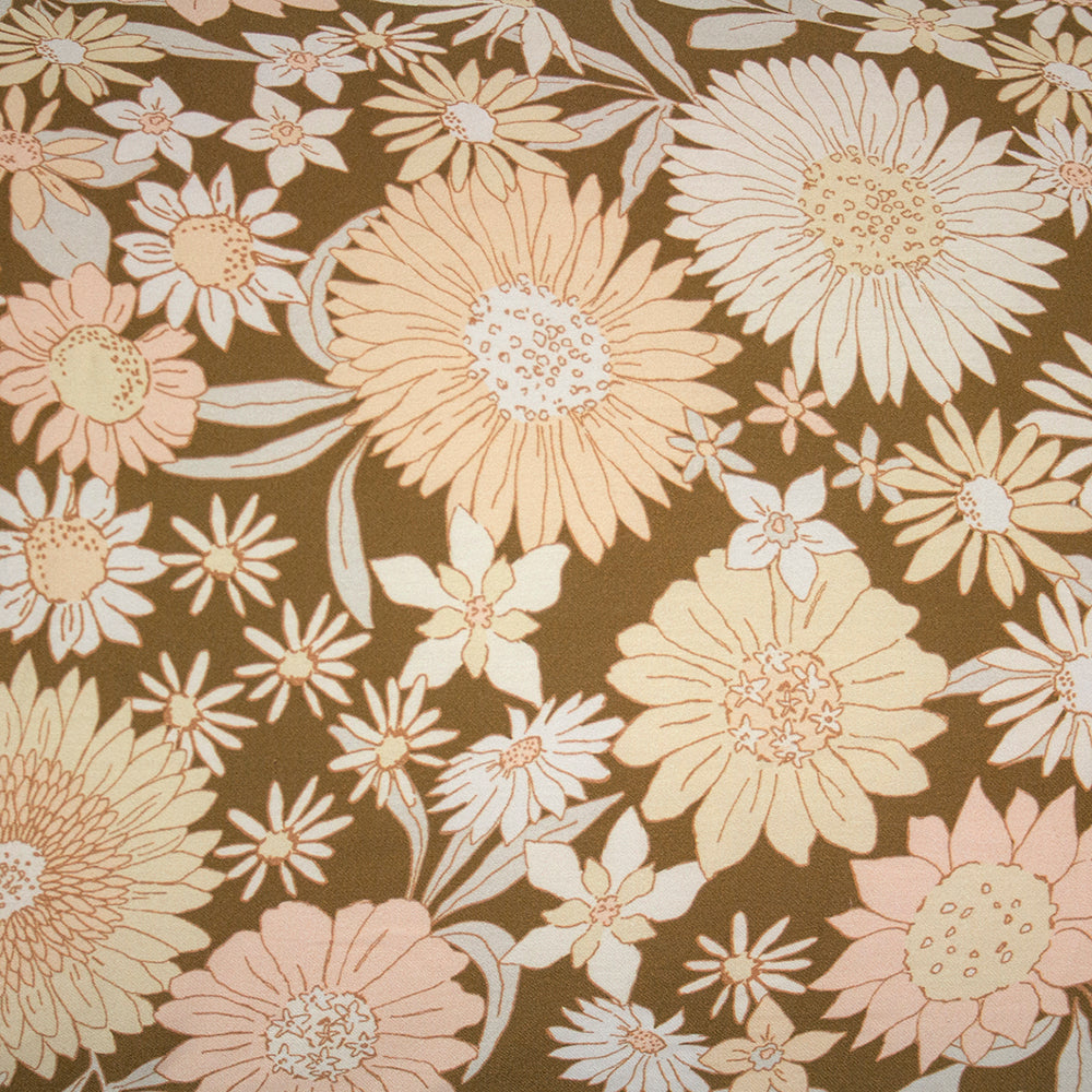 Vibrant retro floral king duvet cover set by Bambury in yellows and peach, with a reversible design and matching pillowcases.