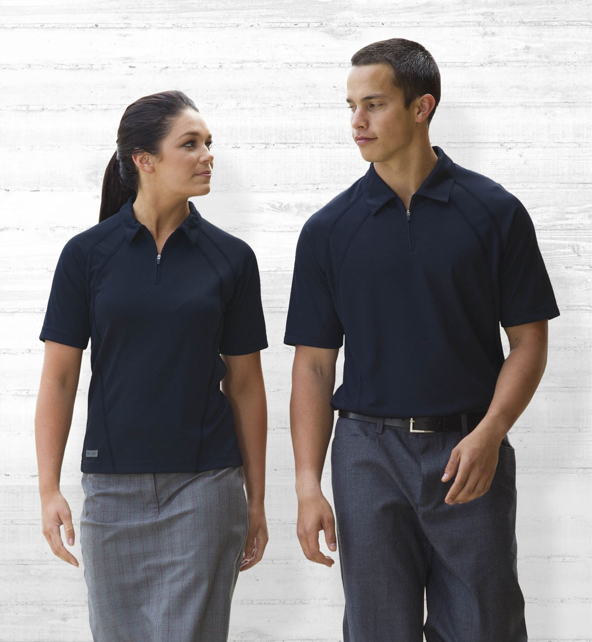 Dri Gear Active Polo for women, featuring moisture-wicking fabric, UV protection, and stylish raglan sleeves for versatile wear.