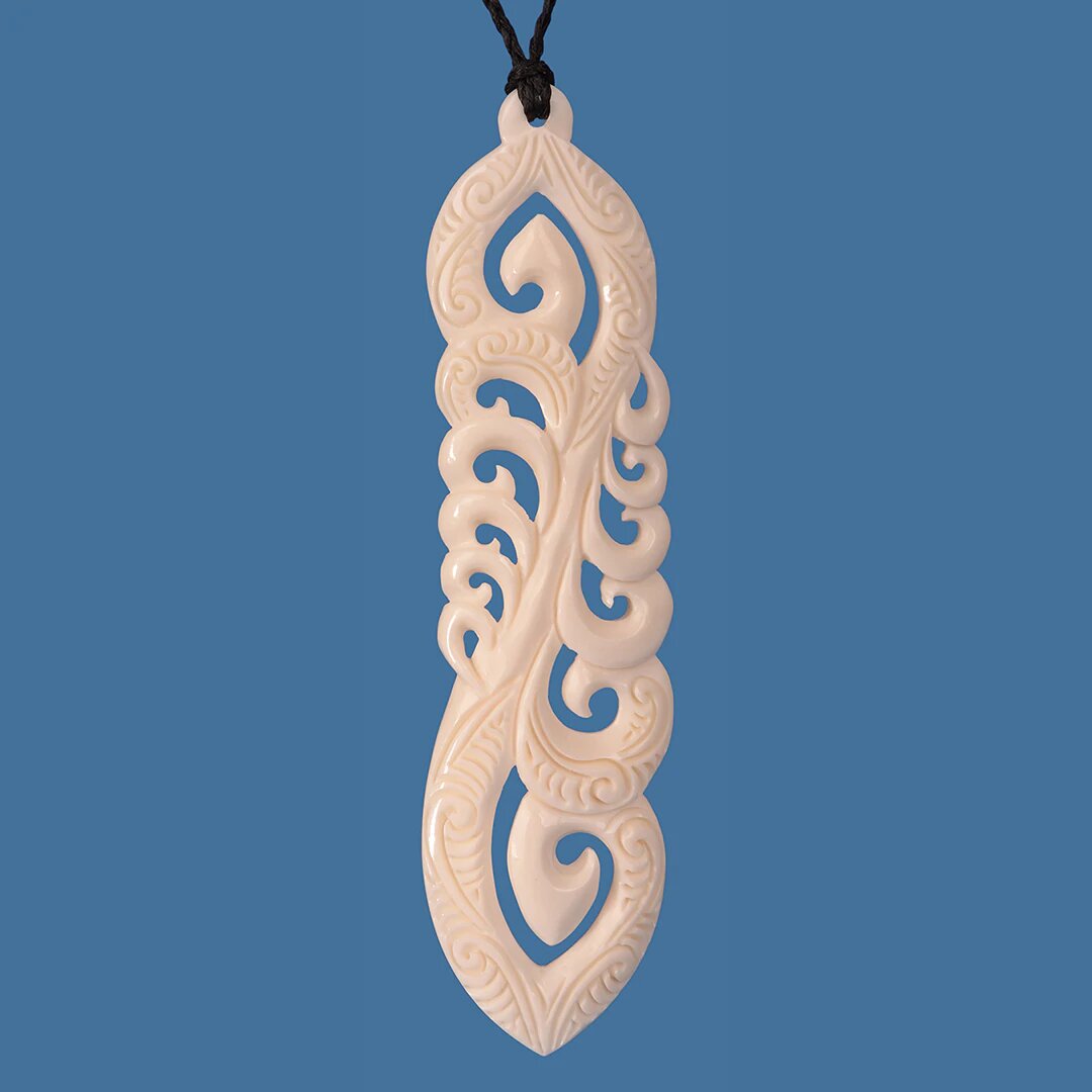 XL Bone Koru Family pendant featuring a unique koru design, celebrating family bonds in exquisite Maori jewellery.