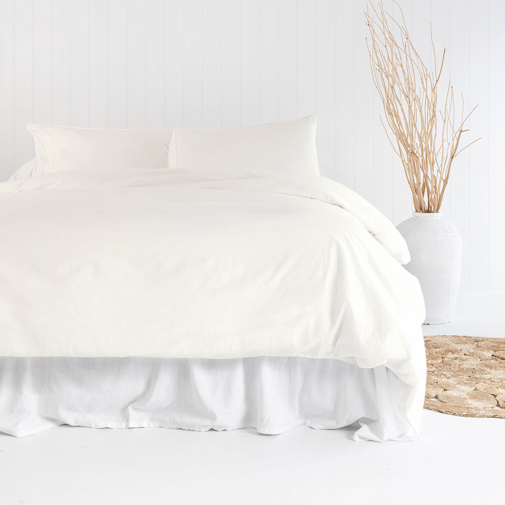 Single duvet cover set in ivory, made from 100% organic cotton, featuring a simple border and ultra-soft vintage-washed fabric.