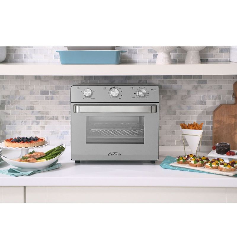 Sleek stainless steel Sunbeam Oven + Air Fryer, 22L multi-function appliance for healthy cooking and versatile meal preparation.