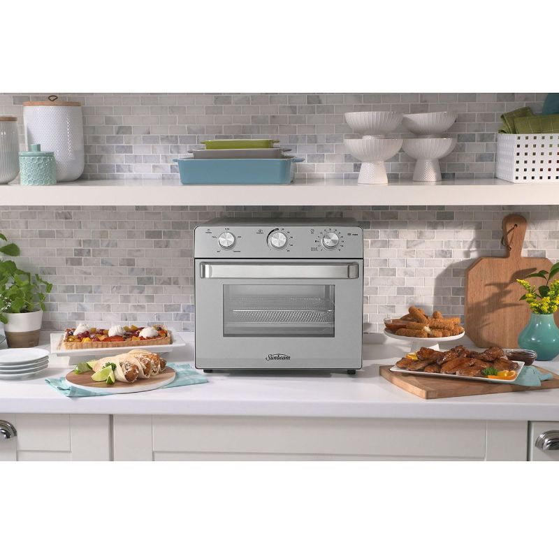 Stainless steel Sunbeam Oven + Air Fryer, 22L capacity, multi-function cooking including air fry, grill, and bake with digital timer.